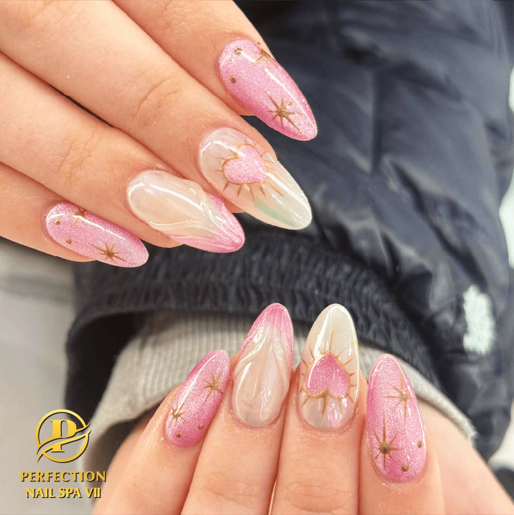 Pink gradient almond nails with star accents