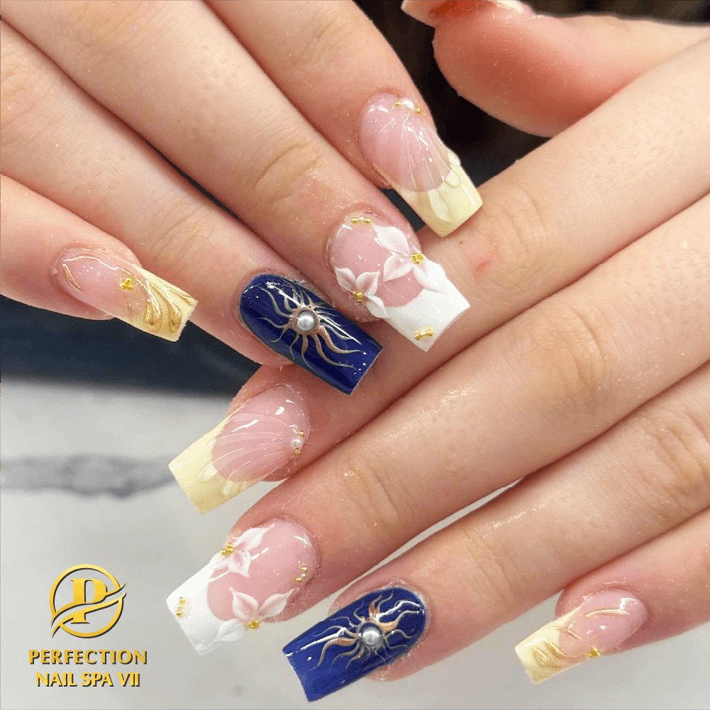 Blue and ivory floral coffin nails with gold