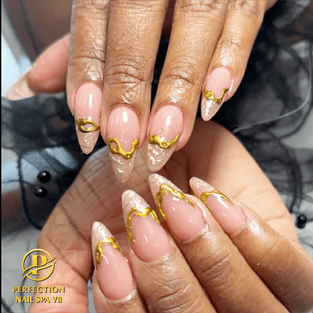 Nude almond nails with gold lace chain design